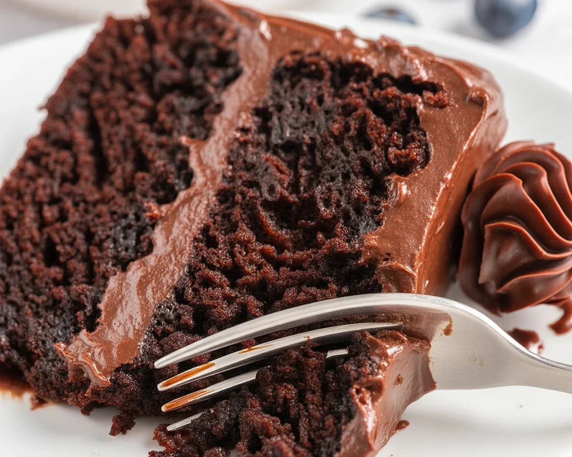 Delicious dairy free cake showcasing moist chocolate and vanilla variety with no eggs or dairy.